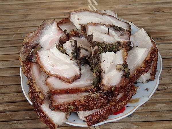 enjoy roasted pork with stick